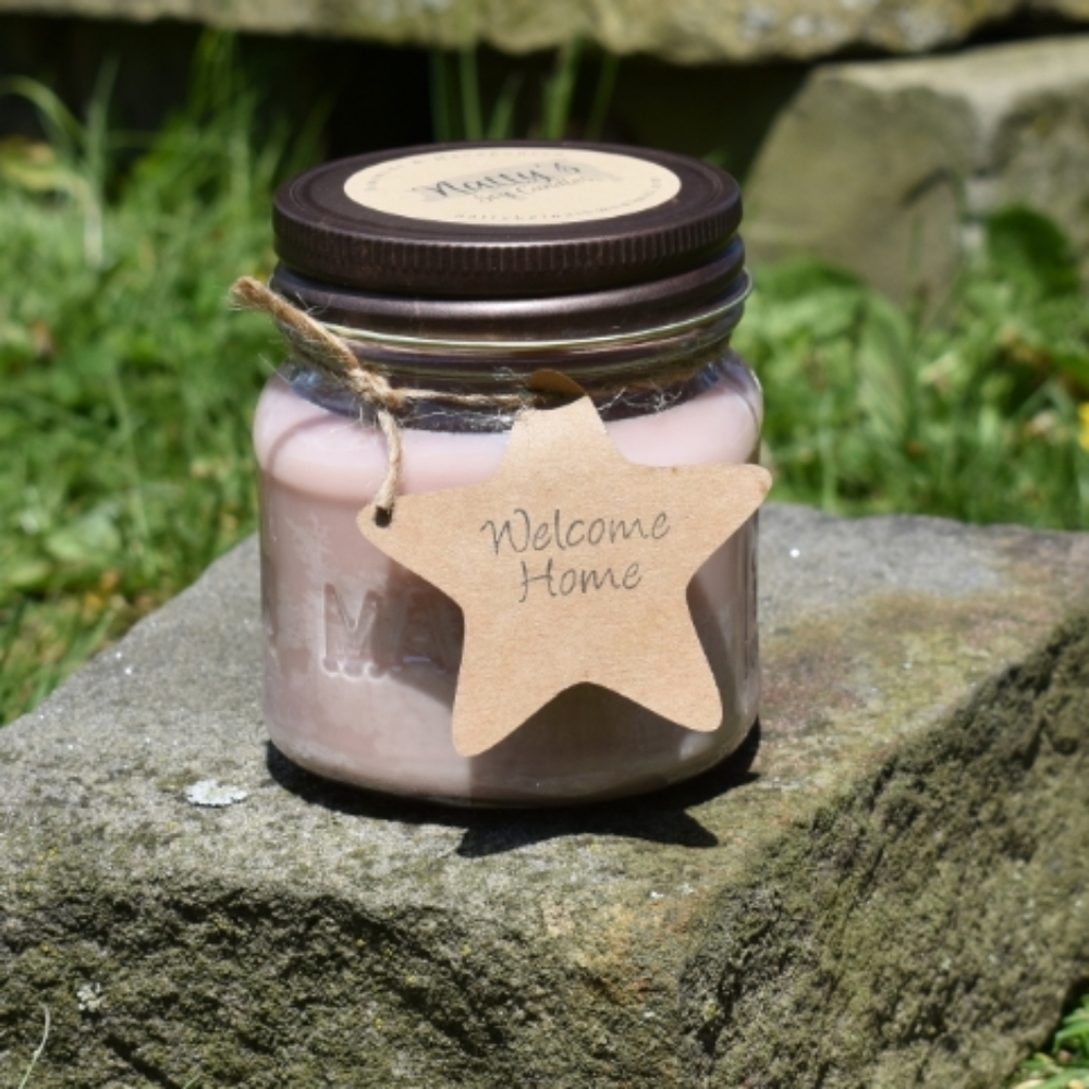 Hand poured 16oz. Welcome Home Soy Candle